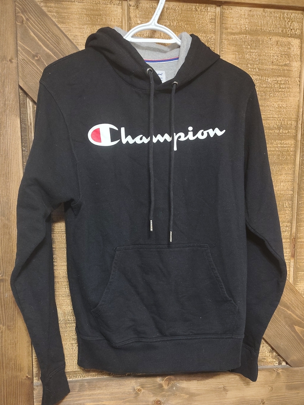 Champion Black Hoodie with White Logo and Red Accent